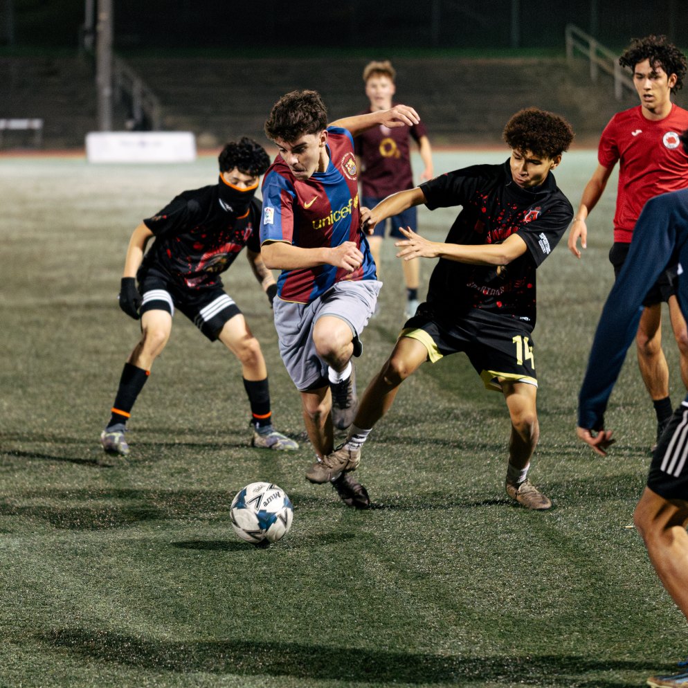 Young men playing football